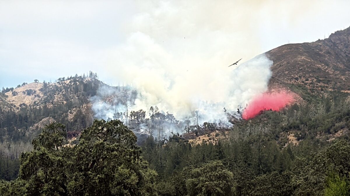 An air tanker pulls away from its retardant drop on the Ledson Fire.