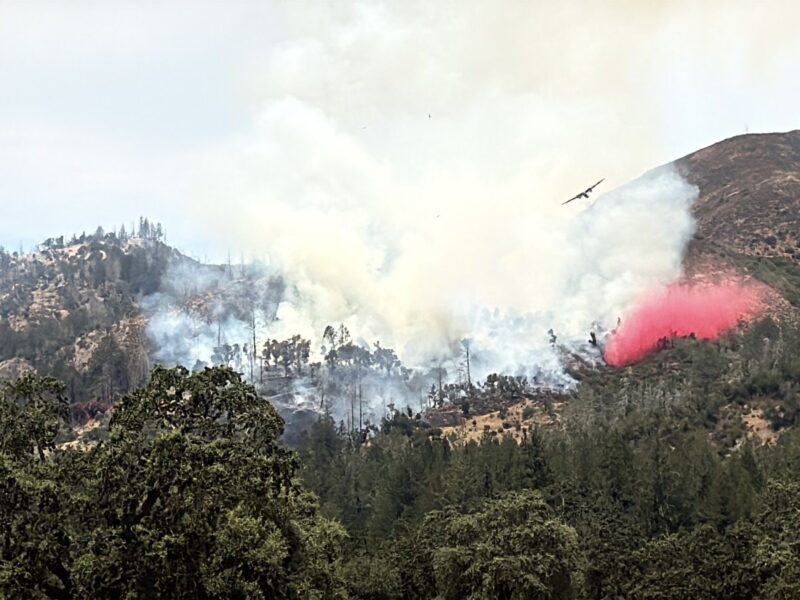 An air tanker pulls away from its retardant drop on the Ledson Fire.